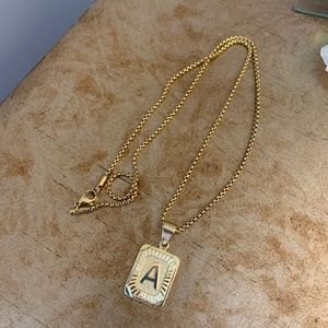 gold initial “A” necklace